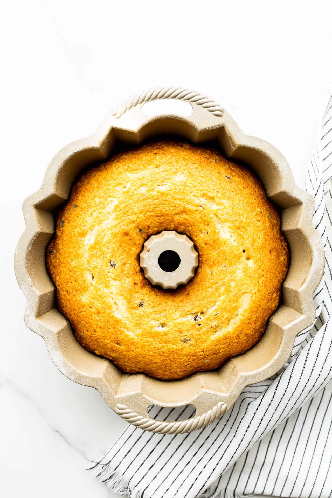 Freshly baked bundt cake in bundt pan before unmoulding.