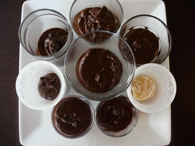 Homemade nutella made from different nuts portioned out into small glasses