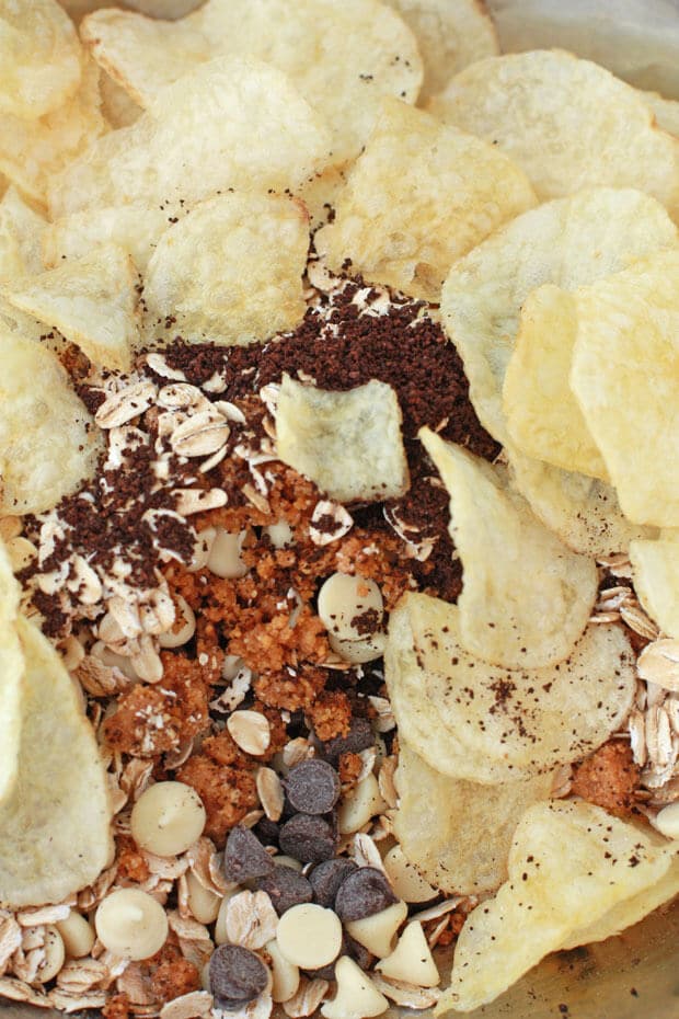 Compost cookies ingredients include potato chips, oats, graham cracker crust, chocolate chips, white chocolate chips, and even coffee grinds