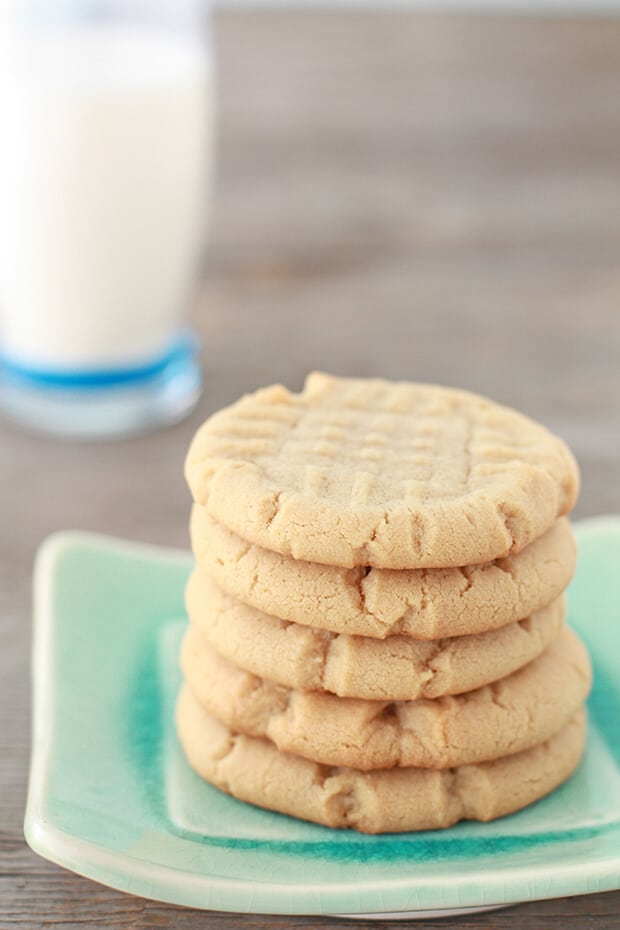 A stack of classic peanut butter cookies made with natural peanut butter.