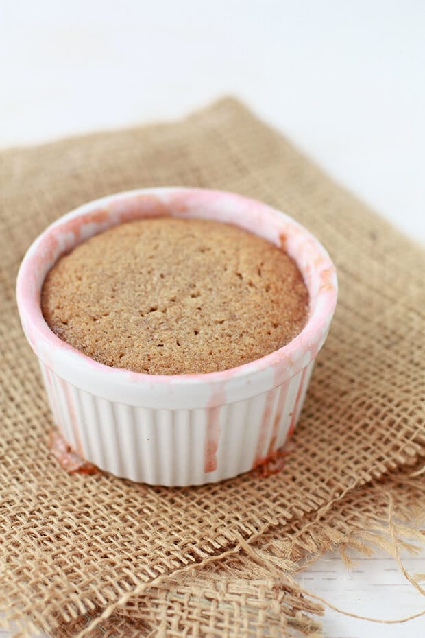 Rhubarb pudding cake baked in a ramekin.