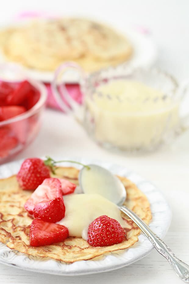 Homemade crepes with strawberries and vanilla pastry cream