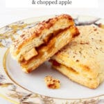 Triangle scones stuffed with apple pie filling served on a plate