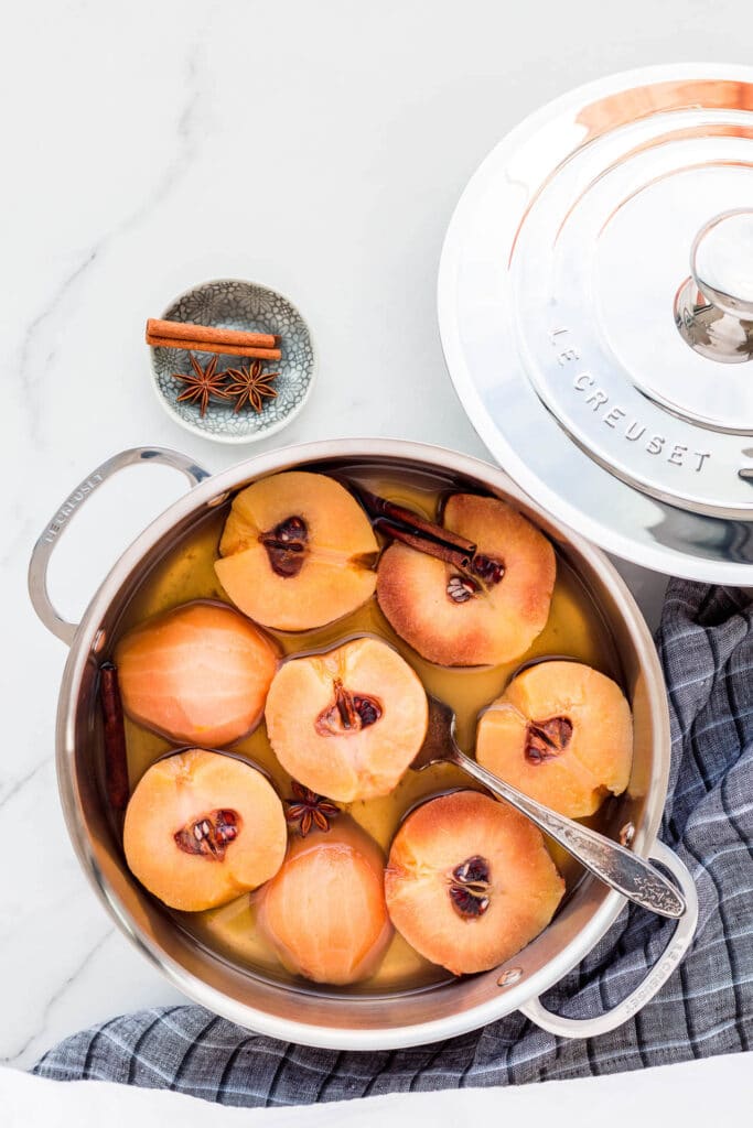 Poached quince in a rondeau pan from Le Creuset.