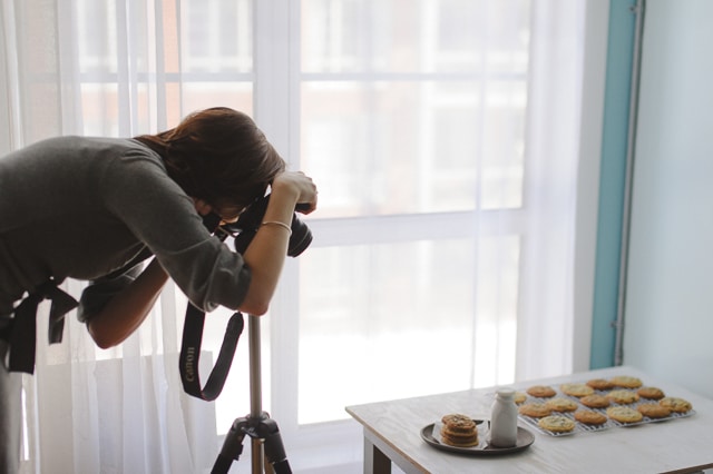 Janice Lawandi photographing freshly baked cookies.