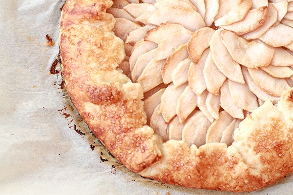 baked apple galette with apples arranged decoratively