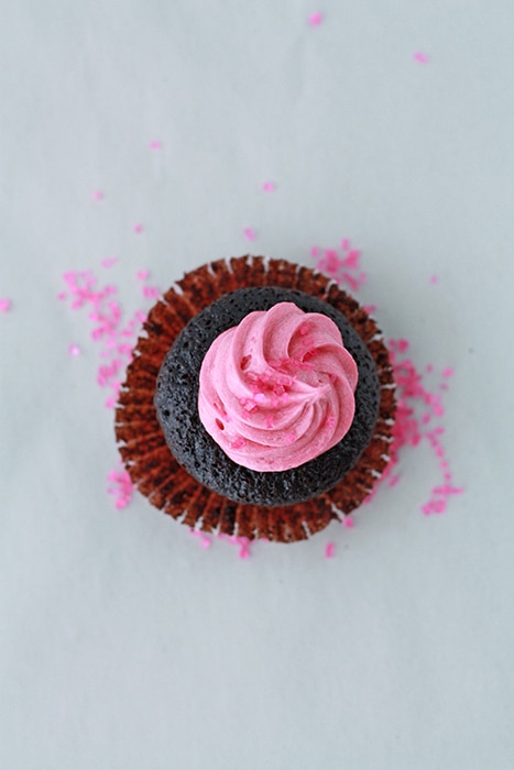 chocolate cupcakes with raspberry frosting view from above