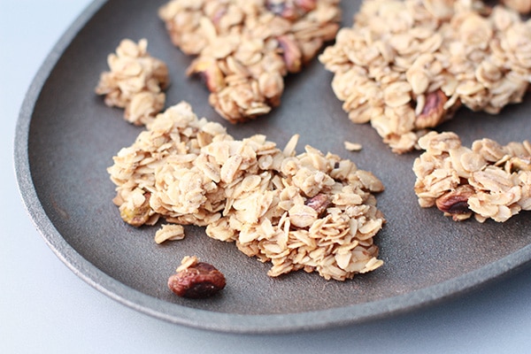 Granola clusters on a cast iron plate