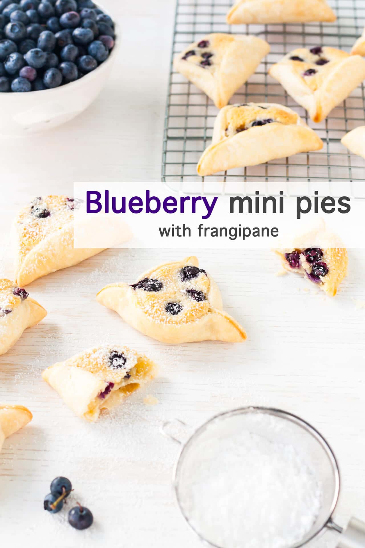 Blueberry mini pies with frangipane, triangle shaped mini pies