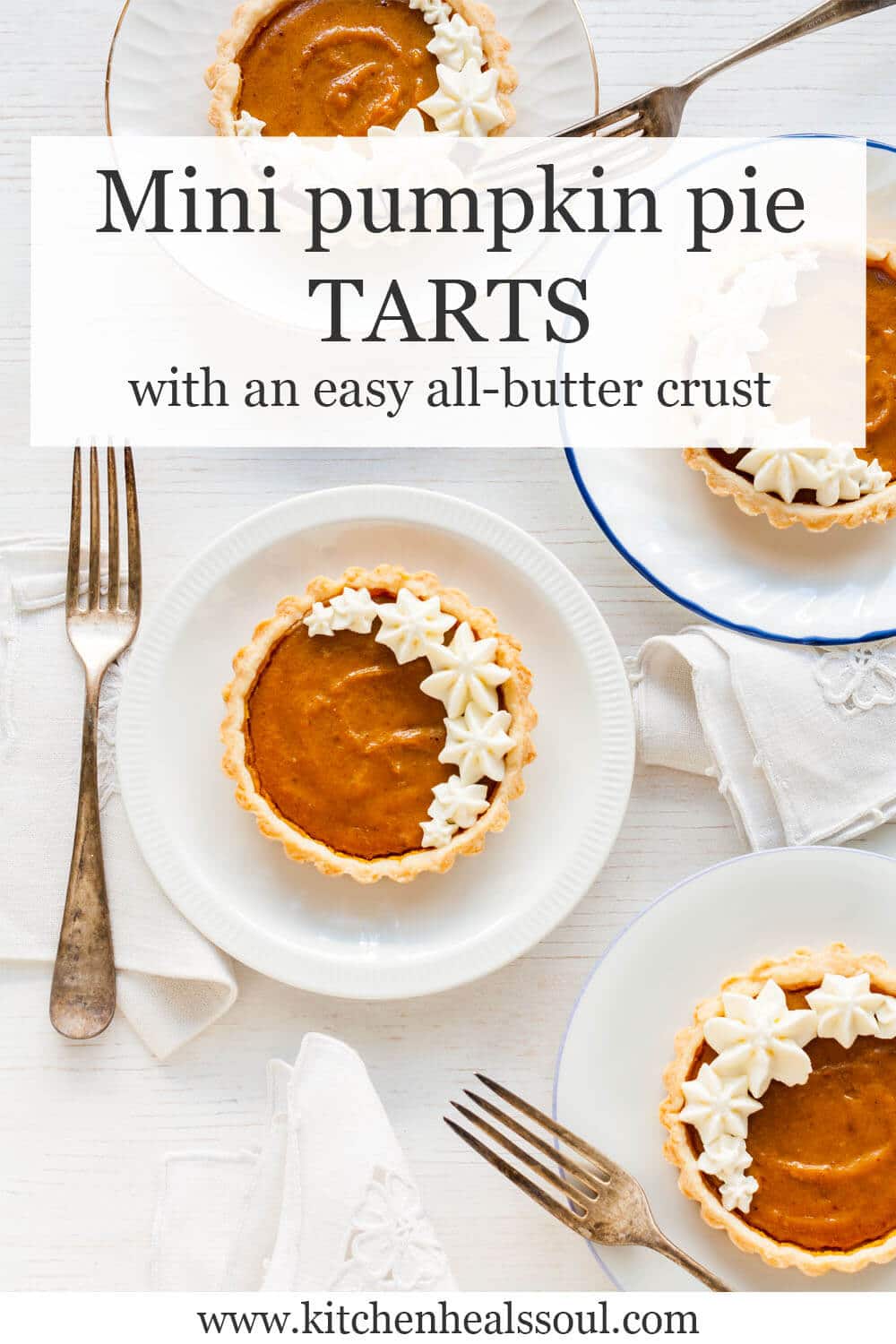 Mini pumpkin pie tarts served on white plates with forks