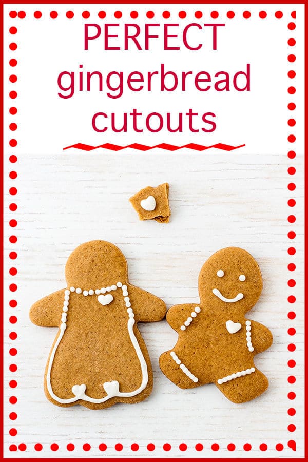 Gingebread boy and gingerbread girl with gingerbread hearts