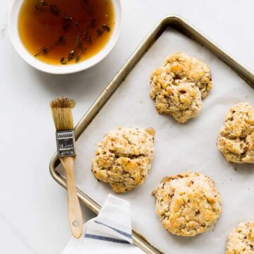 Bourbon-maple glazed cheddar bacon biscuits | bakeschool.com