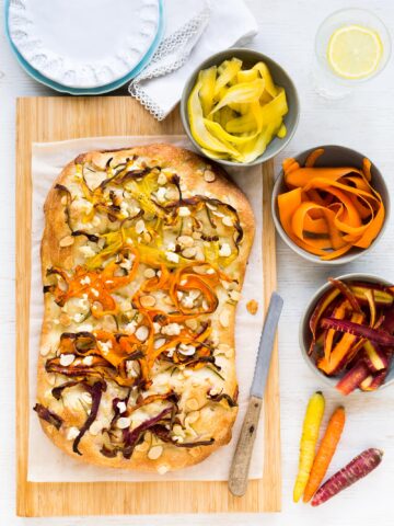 carrot focaccia with feta and almonds