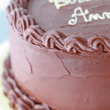 Chocolate caramel cake with chocolate frosting and caramel filling between the layers