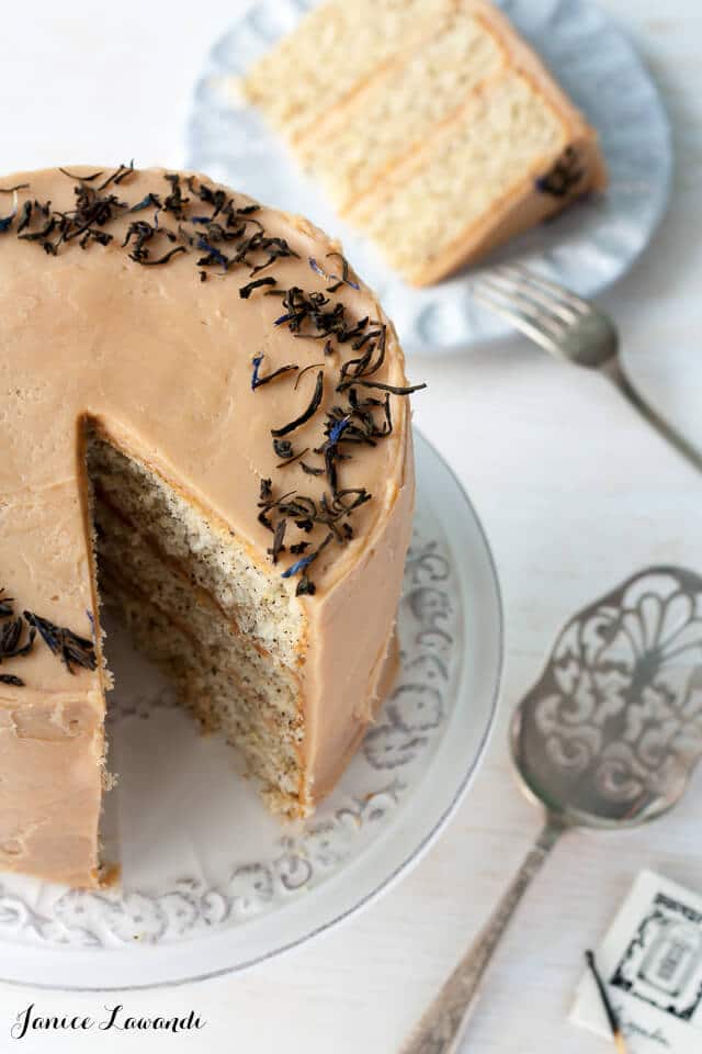 This Earl grey tea cake is a layer cake infused with Earl Grey tea. Earl Grey tea is used in the cake layers, in the Earl Grey frosting, and in the garnish.