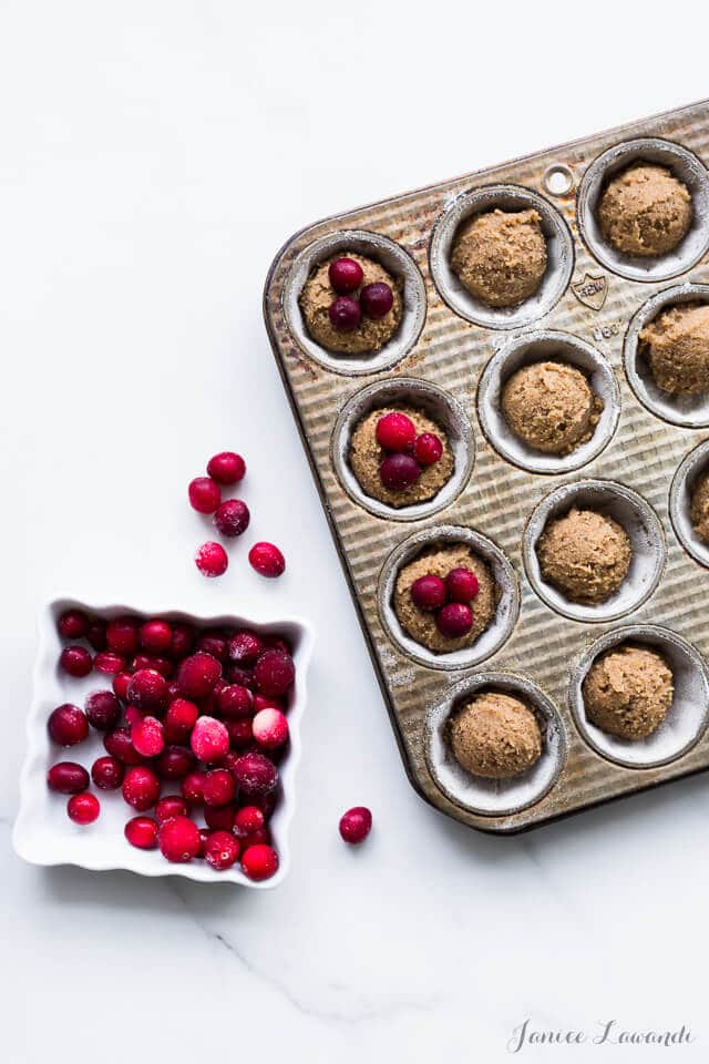 Scoop cake batter into pan and top with cranberries