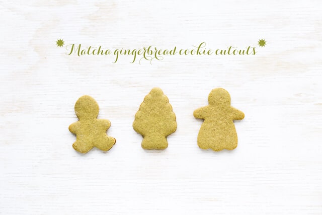 Three matcha gingerbread cookies, cutout in shapes of a boy, a tree, and a girl.