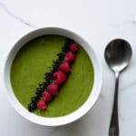 Green smoothie bowl with matcha and berries