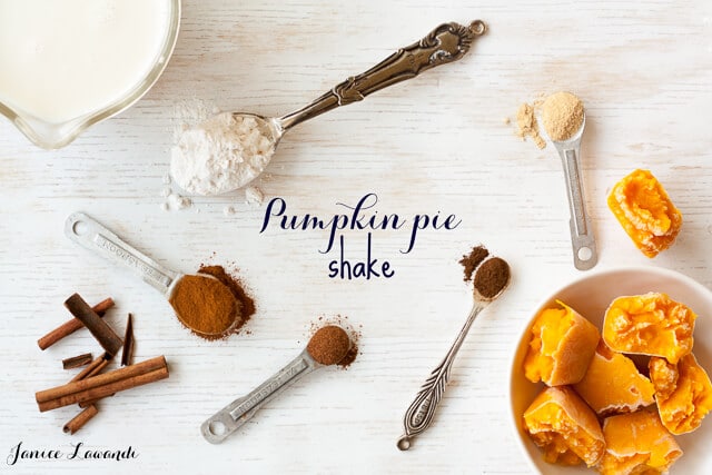 pumpkin pie shake ingredients, made with almond milk and lots of autumn spices, and frozen ice cubes of homemade pumpkin puree 