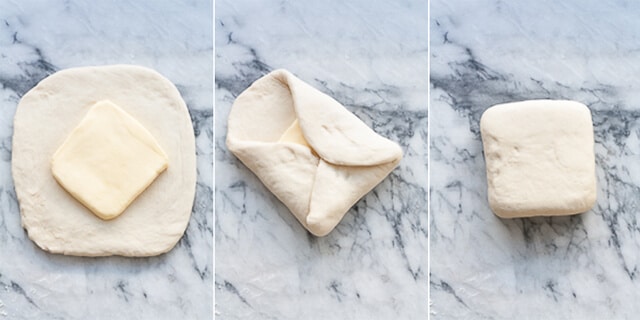 Three step-by-step photos to show how to wrap the butter block in croissants dough for making homemade croissants.