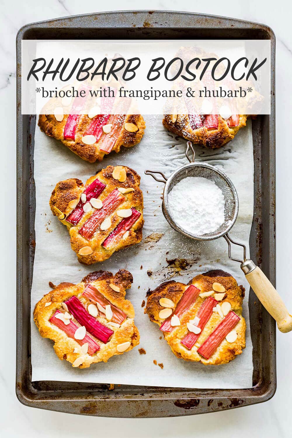 Slices of bostock, which is brioche bread topped with frangipane and rhubarb, baked in the oven until golden brown then dusted with powdered sugar