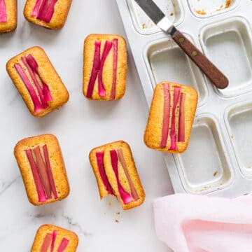 unmolding orange rhubarb cakes with cornmeal from mini loaf cake pan