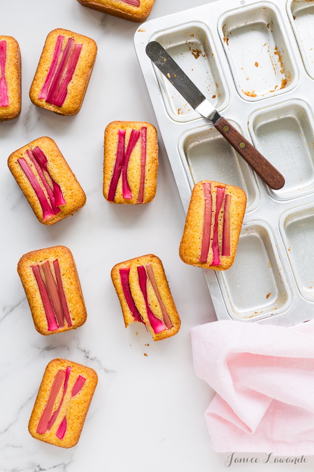 unmolding orange rhubarb cakes with cornmeal from mini loaf cake pan