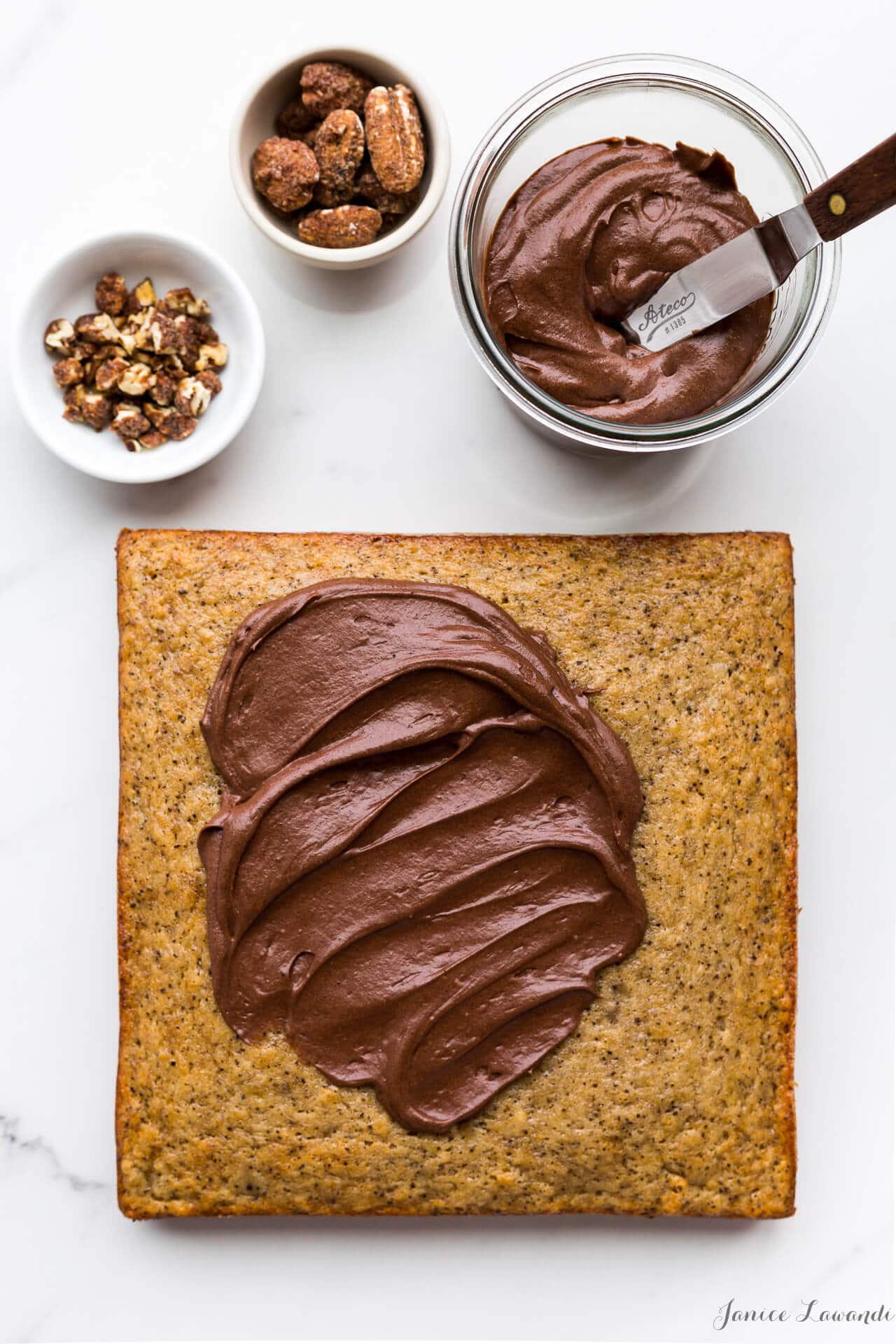 Coffee banana cake flavoured with coffee and topped with milk chocolate frosting