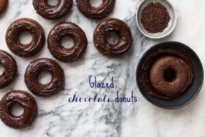 Glazed Chocolate Donuts that are baked donuts, not fried, dipped in a ganache glaze