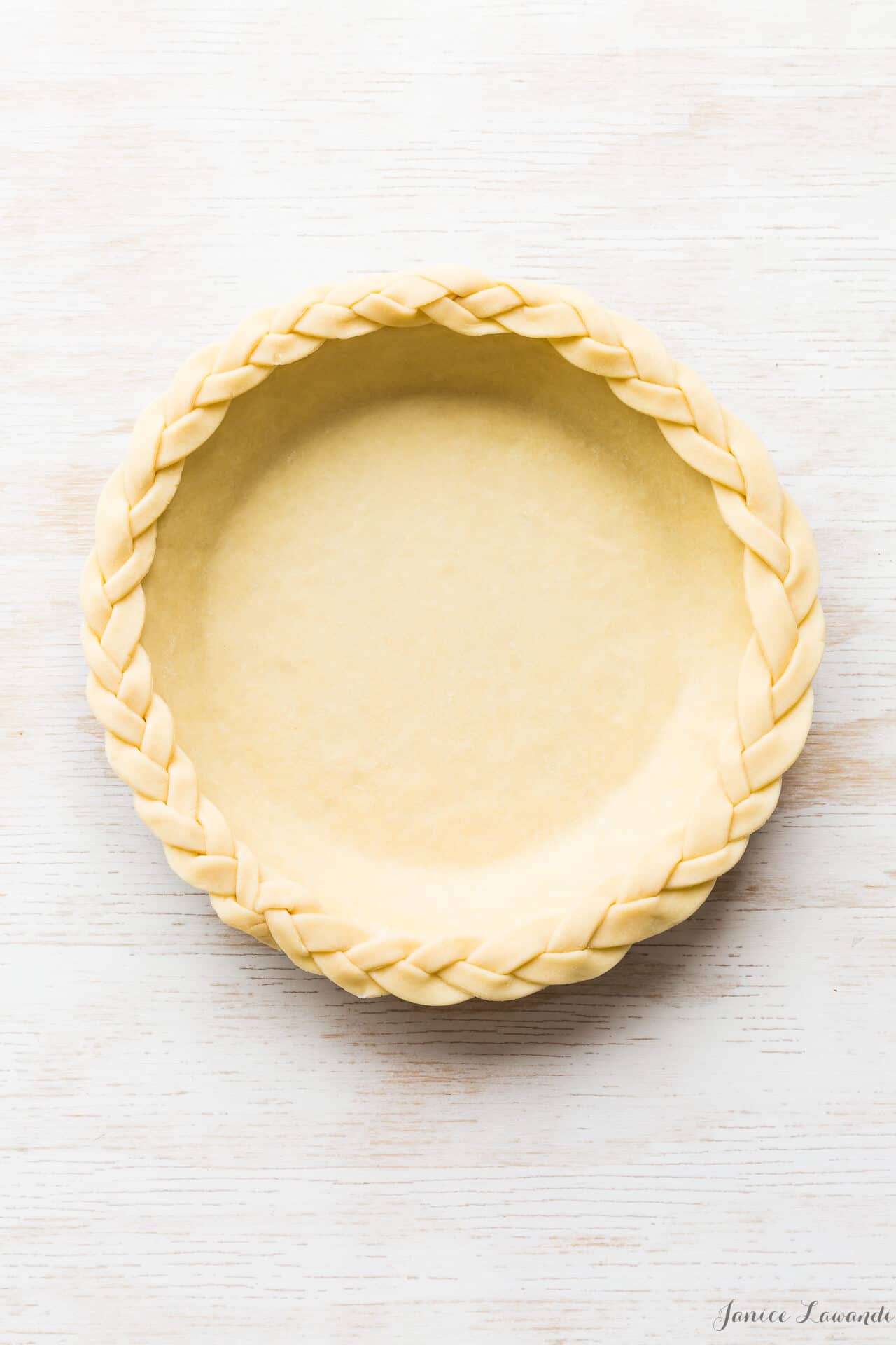 Three-in-One All-Butter Pie Dough  A perfect pie crust is no good if it's  burned. To avoid that risk, we bake the pie shell on a wire rack set in a  rimmed