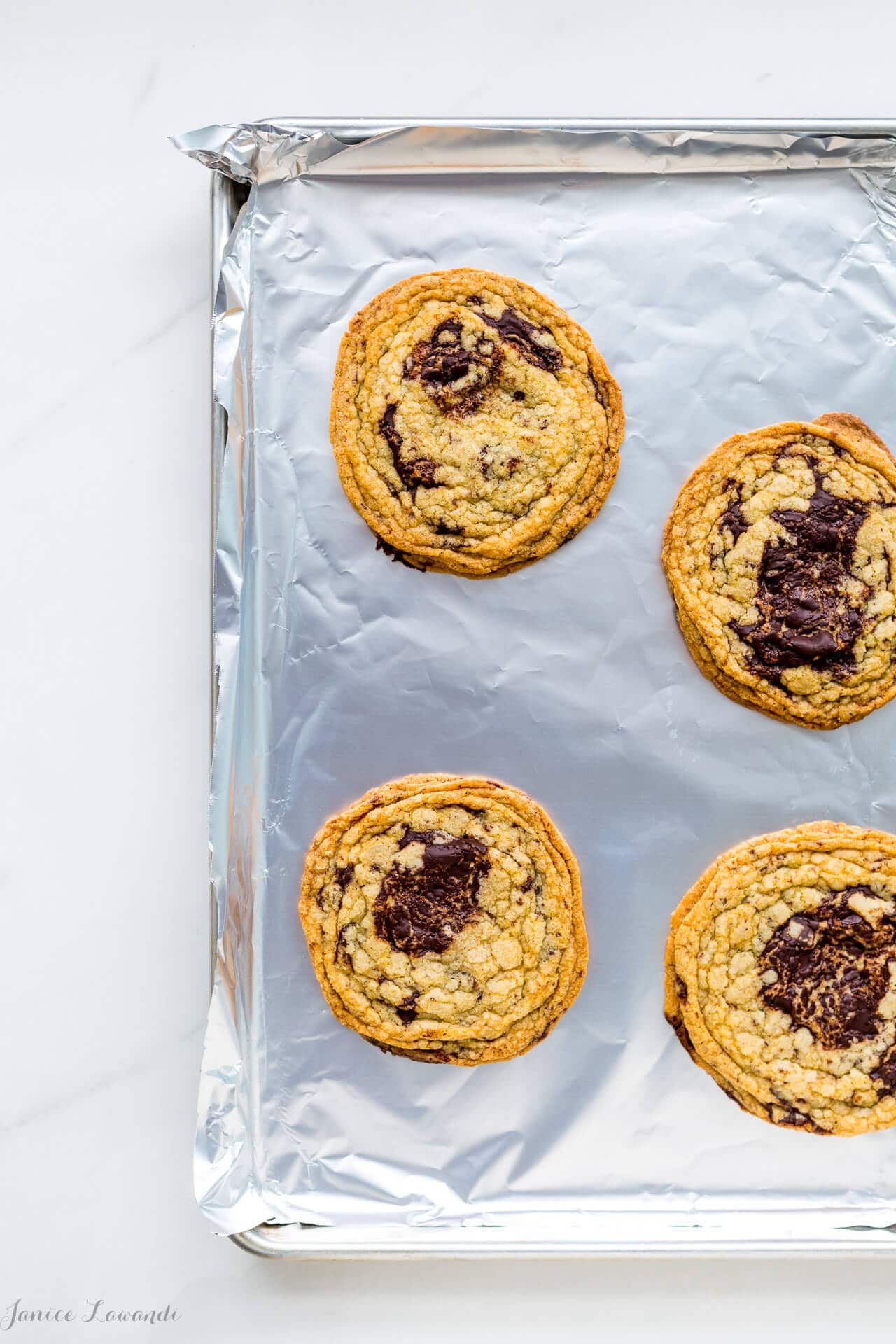 Pan-banging chocolate chip cookies—Giant bakery-style chocolate chip cookies from The Vanilla Bean Baking Book