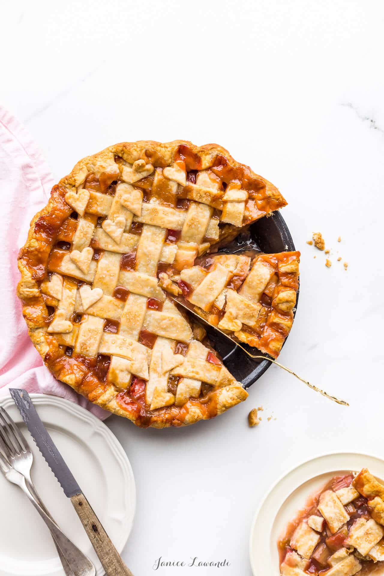 Slice of rhubarb pie with a lattice pie crust