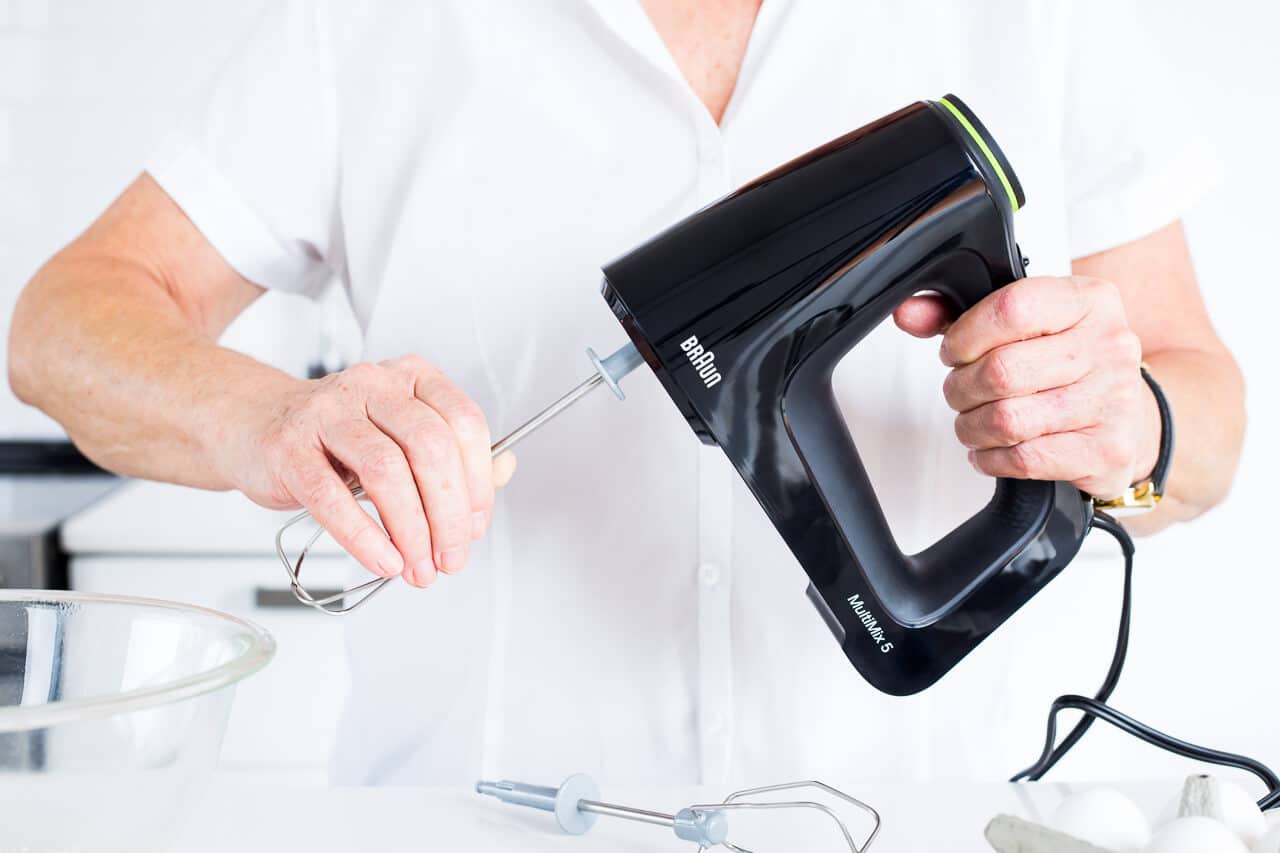 Attaching beaters to Braun hand mixer is easy.