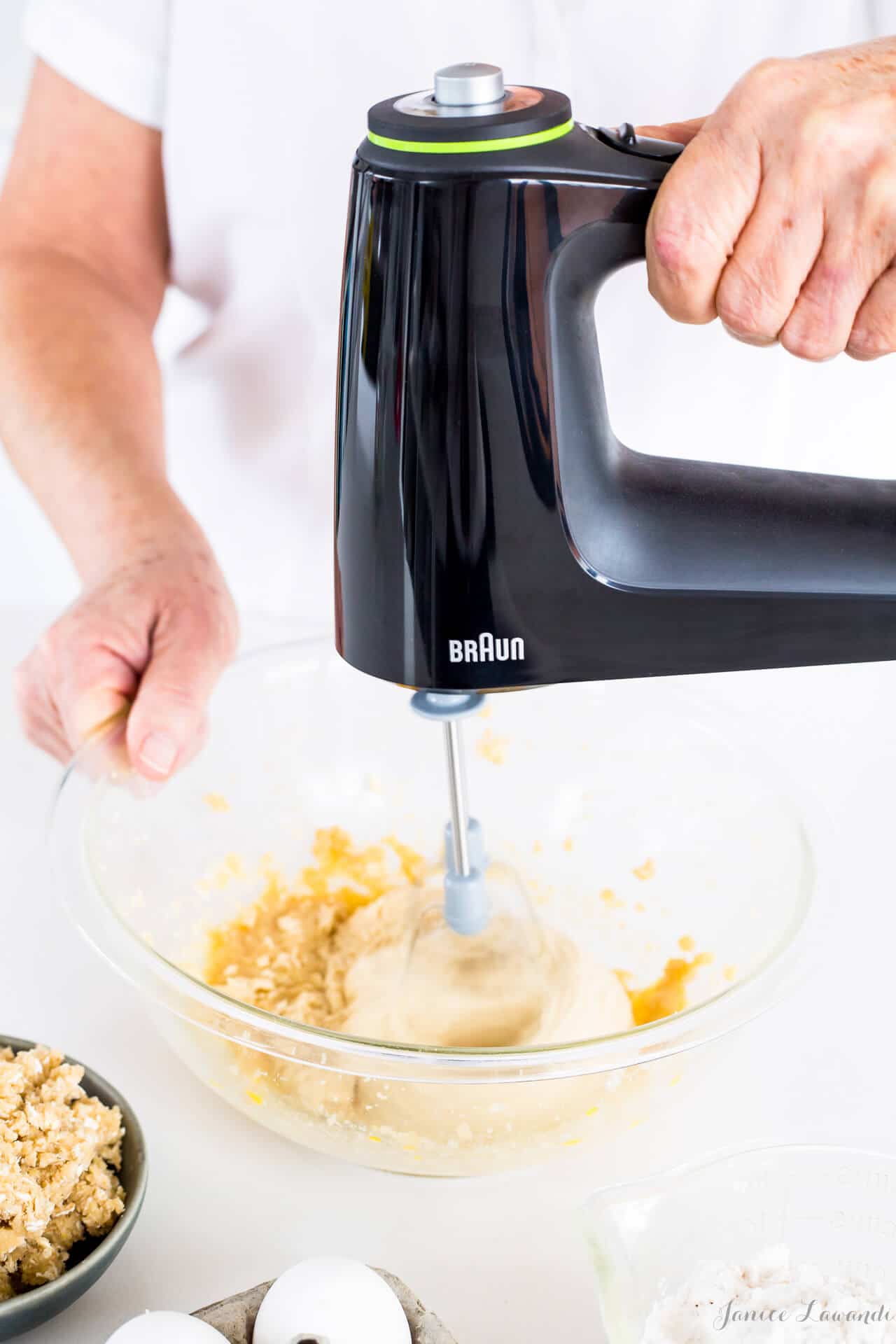 Mixing cake batter with a hand mixer—Alternating wet and dry ingredients to make cake