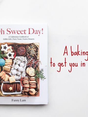 Book cover of Oh Sweet Day! baking book with a gift box filled with a variety of homemade cookies
