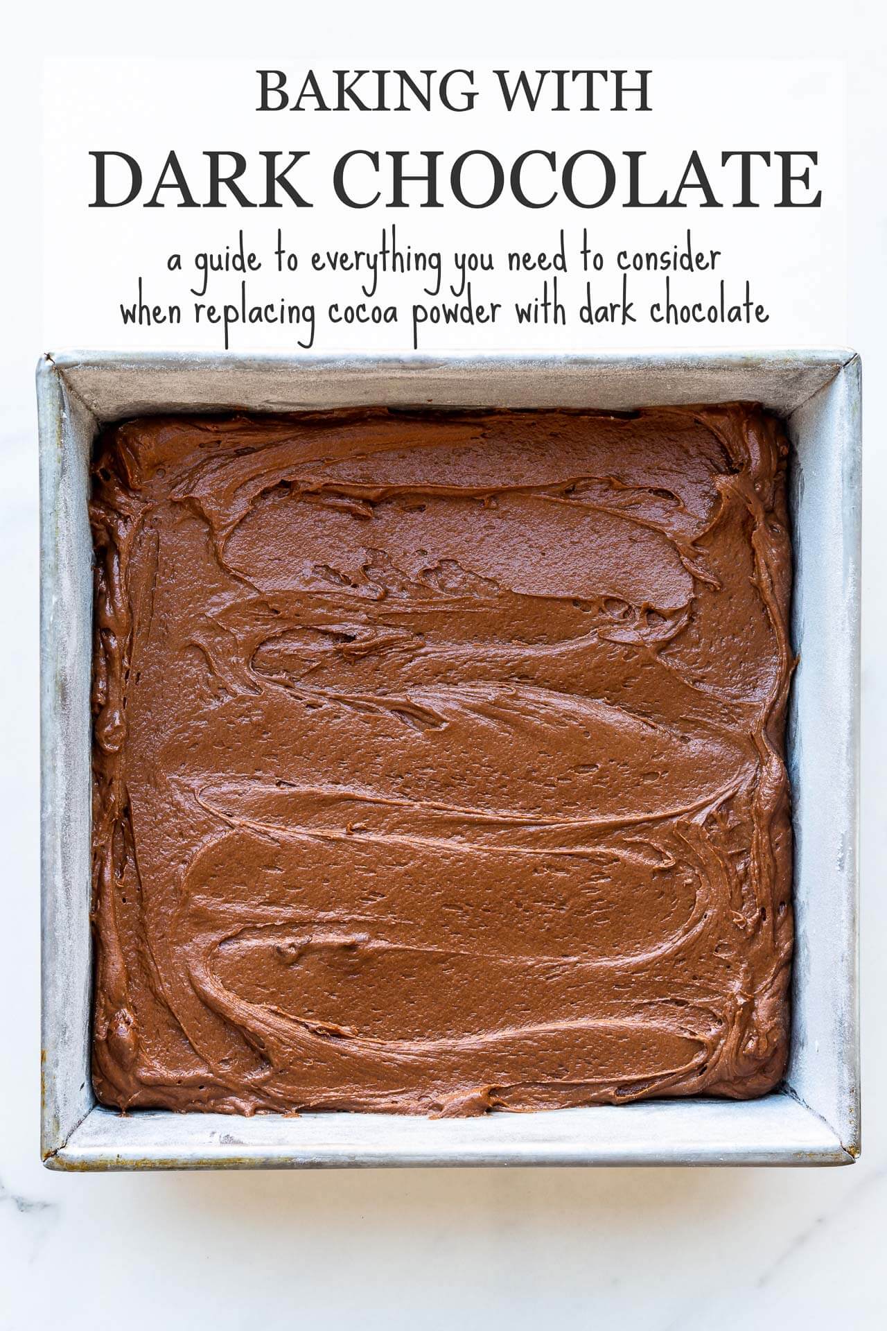 A square cake pan filled with chocolate cake batter that has been swirled