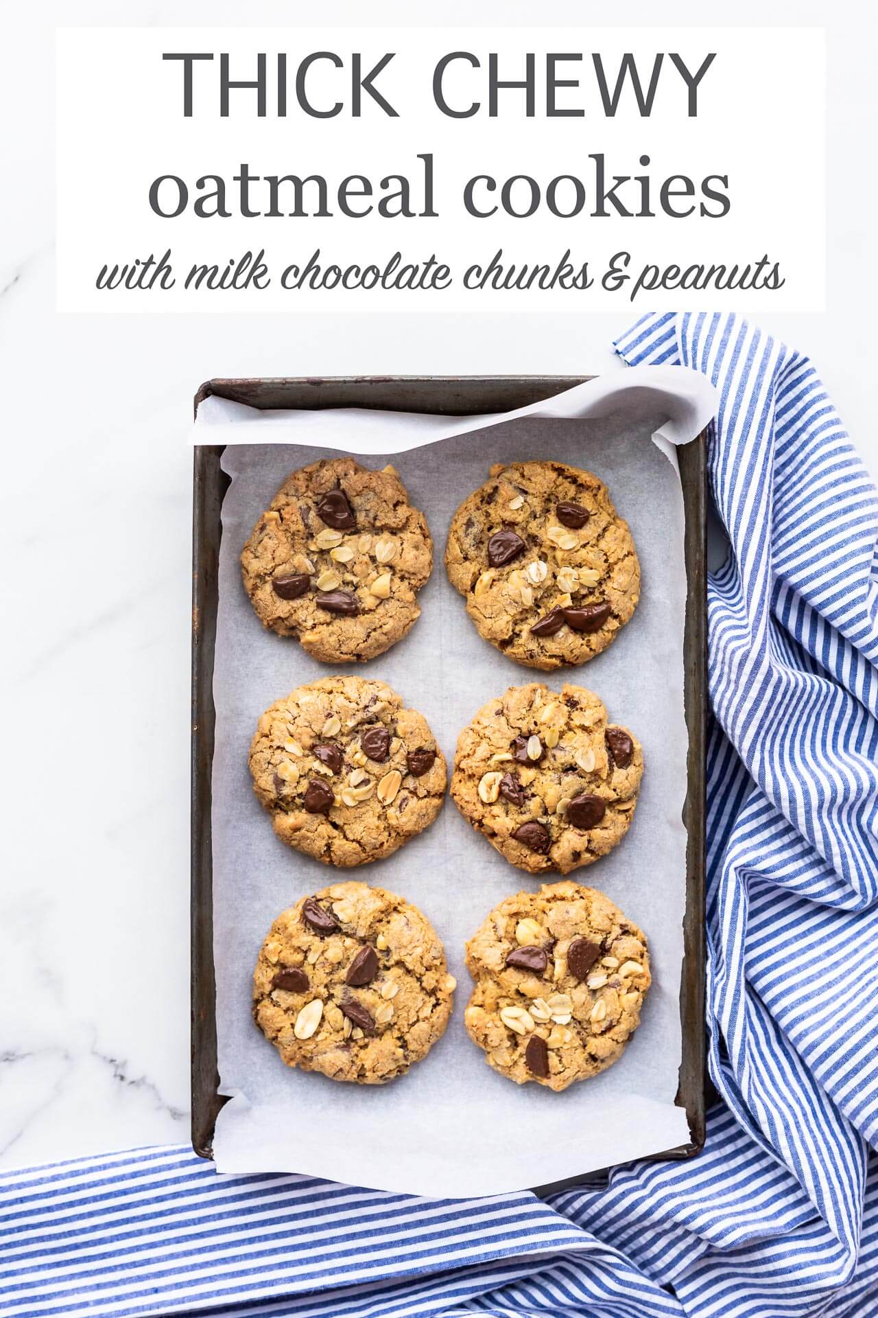 Thick chewy oatmeal chocolate chunk cookies with milk chocolate and salted peanuts