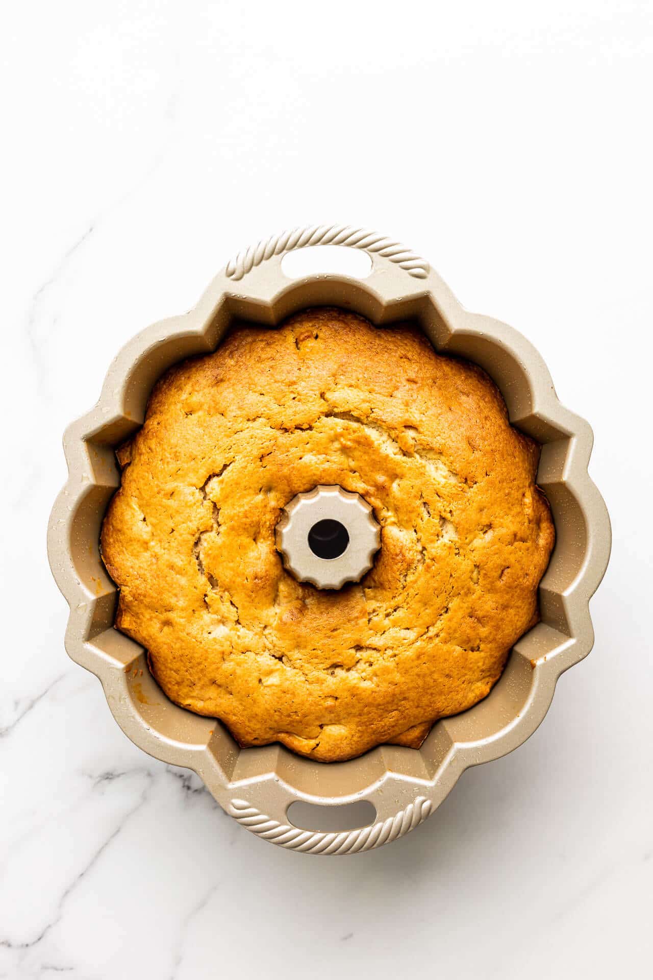 Freshly baked bundt cake still in the cake pan