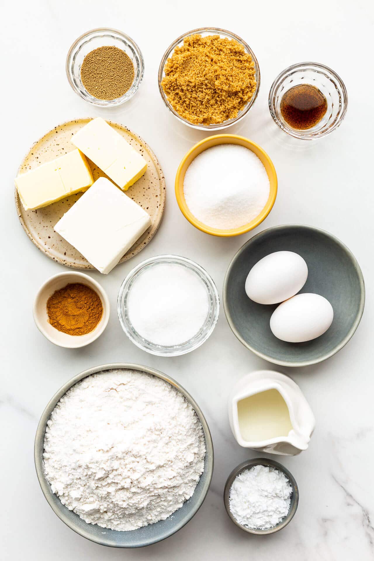 Ingredients to make slow cooker cinnamon rolls in a Crock-Pot measured and laid out