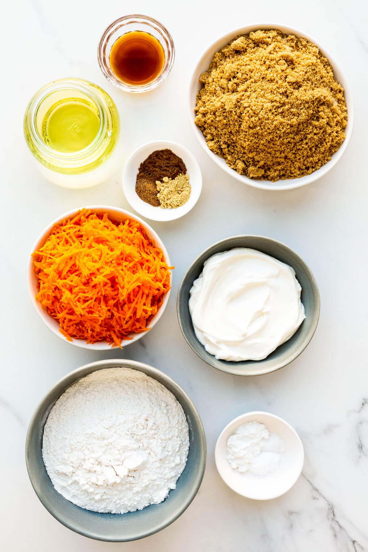 Ingredients to make eggless carrot cake with cream cheese frosting