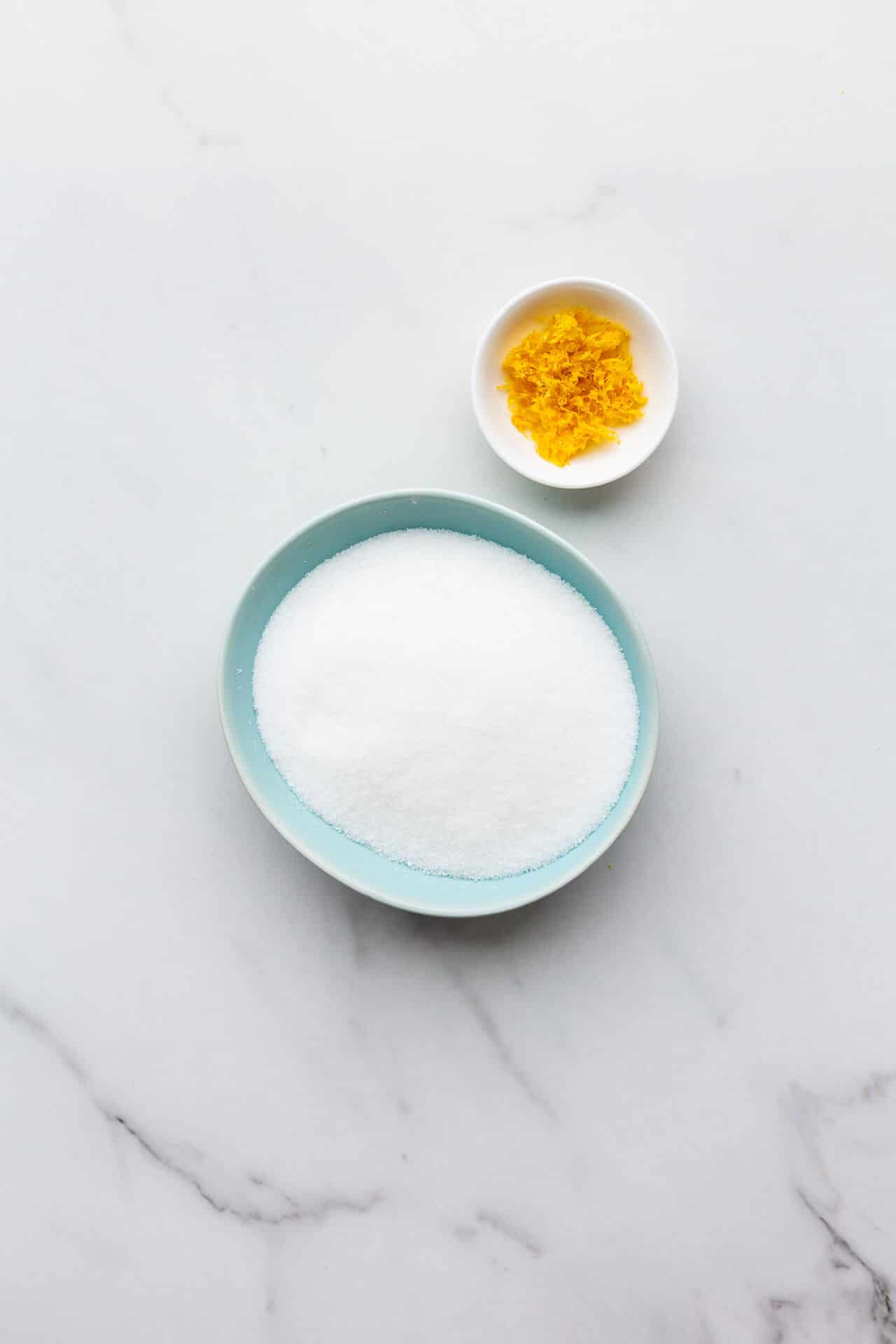 Ingredients to make lemon sugar at home.