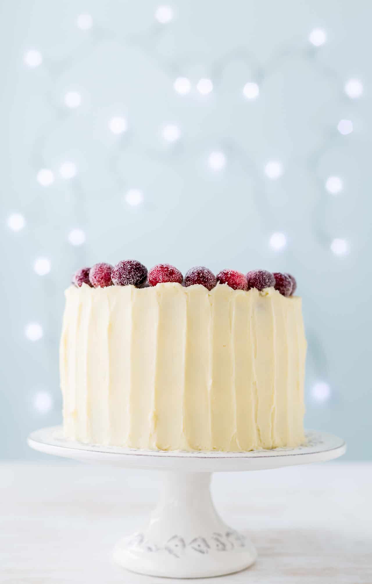 Cranberry topped layer cake with cream cheese frosting.