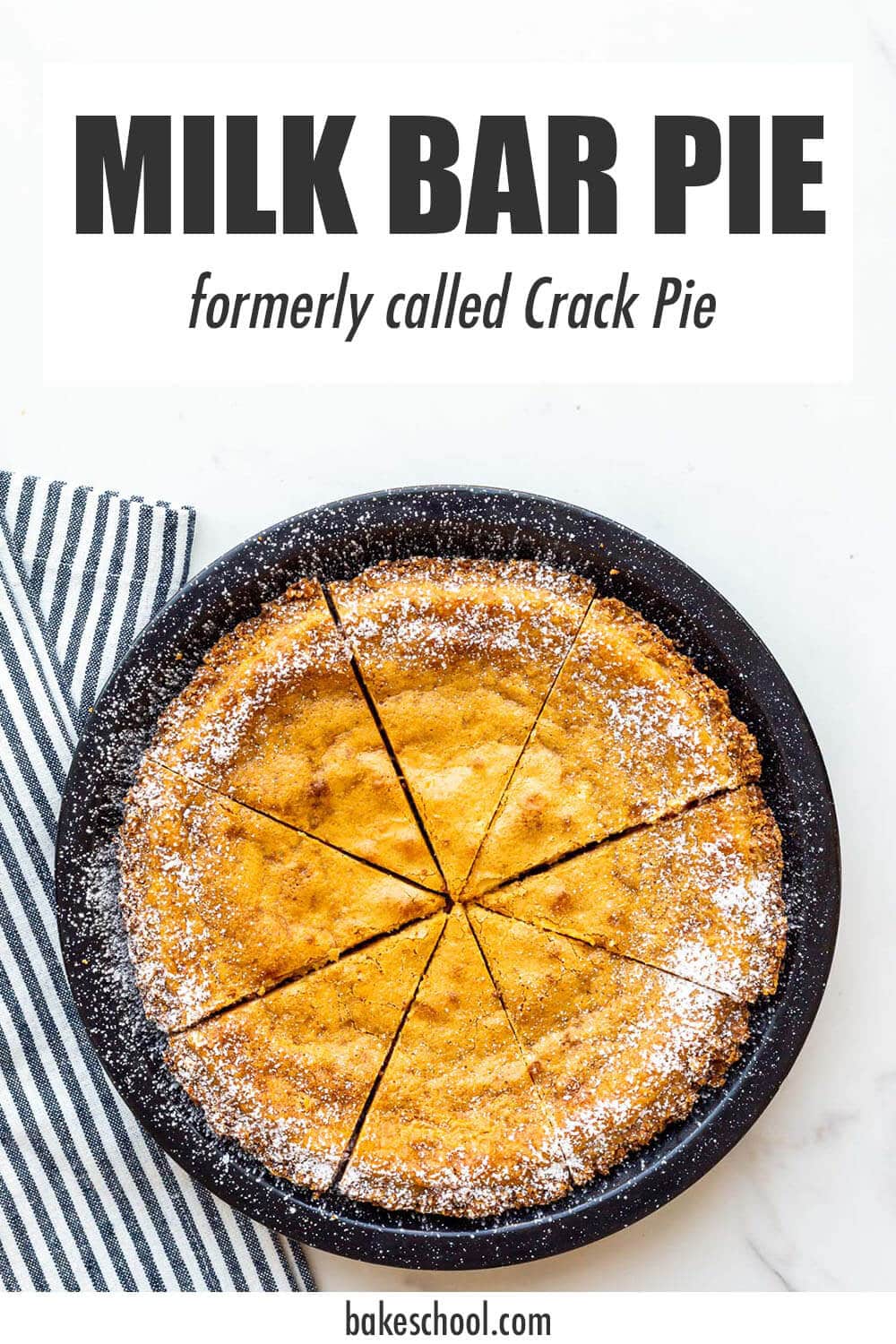 Homemade Milk Bar pie in a metal pie plate, sliced and ready to be served.