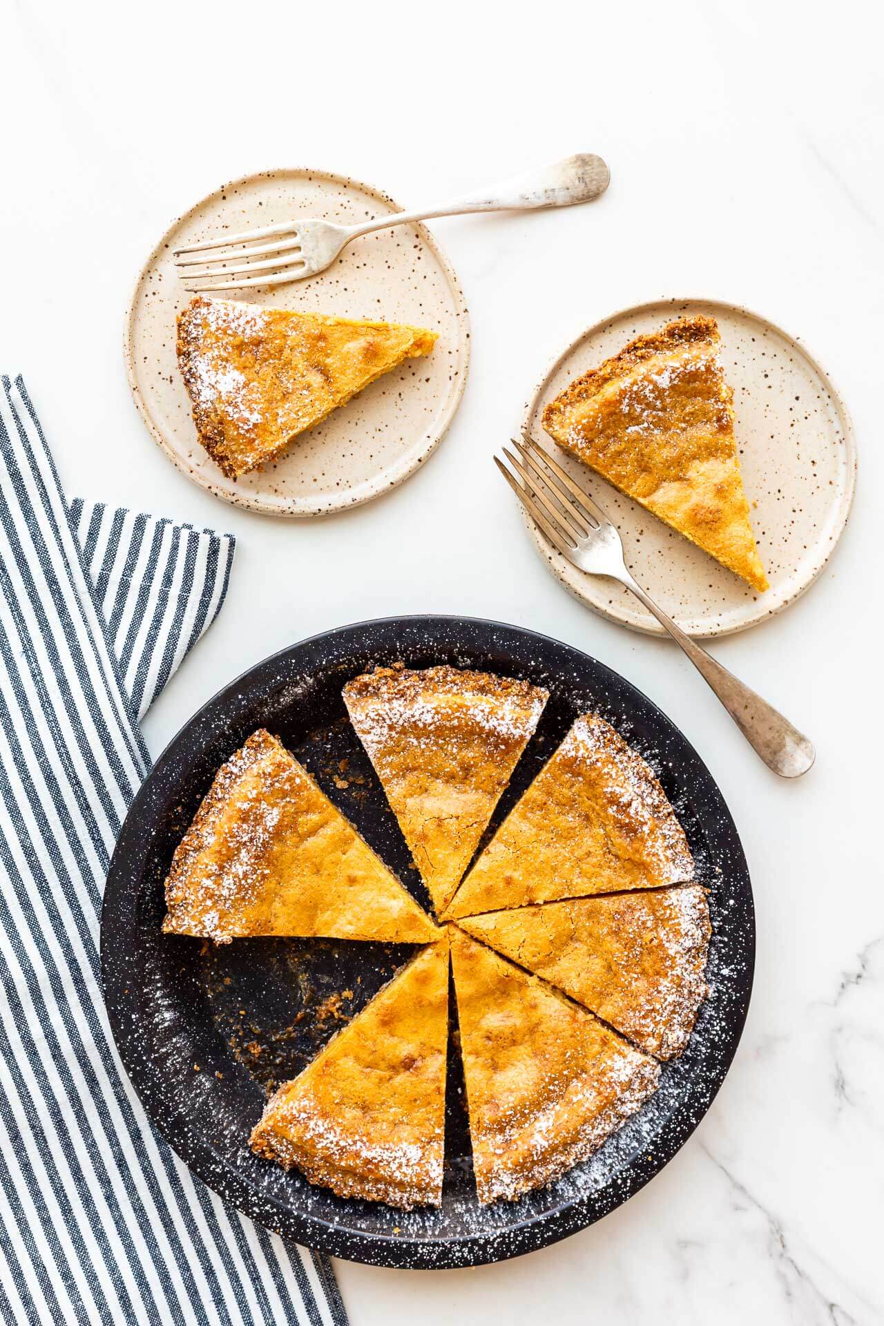 Sliced Milk Bar pie being served on small plates.