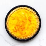 Orange pie with saltine crust and topped with orange marmalade glaze.