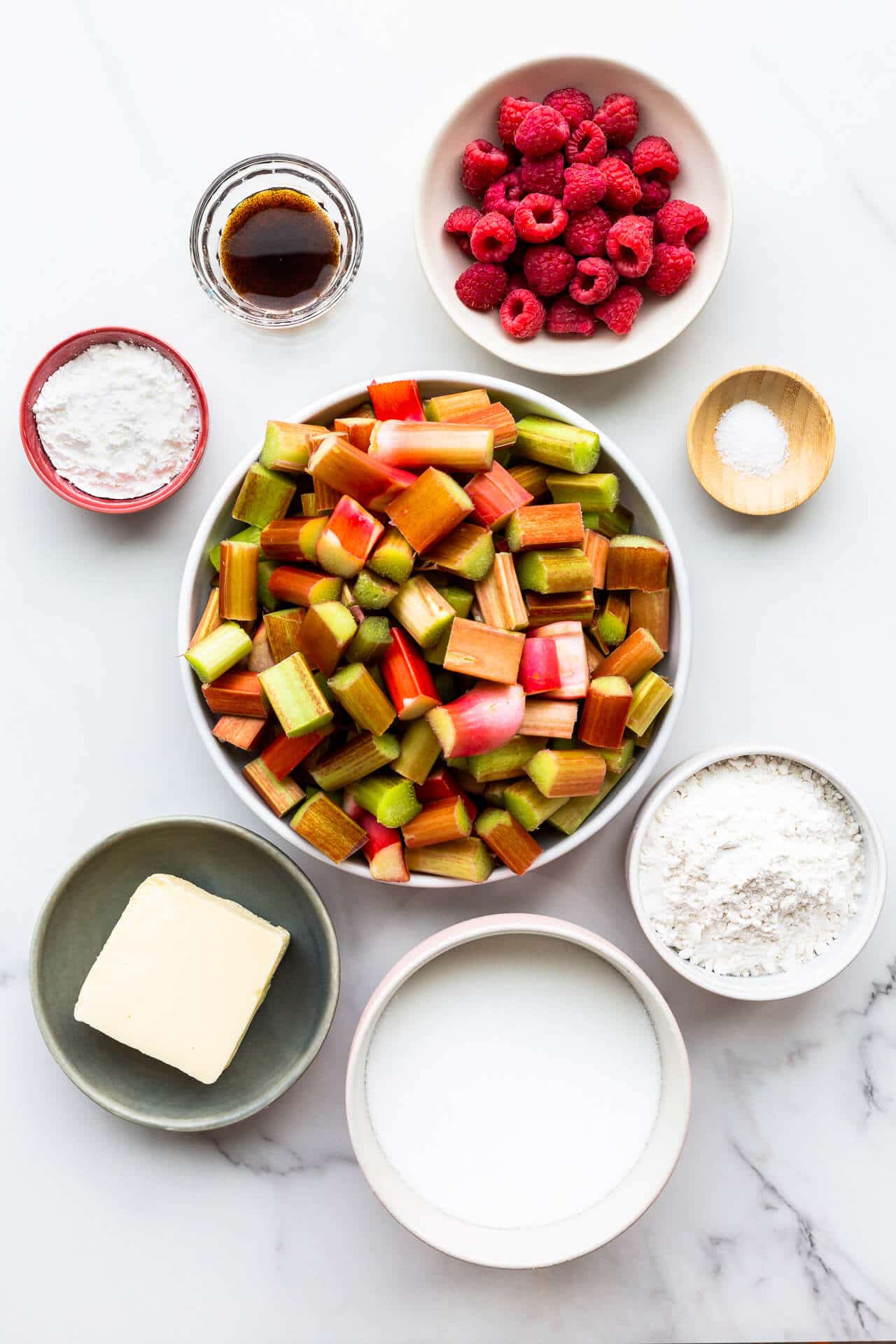 Ingredients to make a rhubarb crumble from scratch.