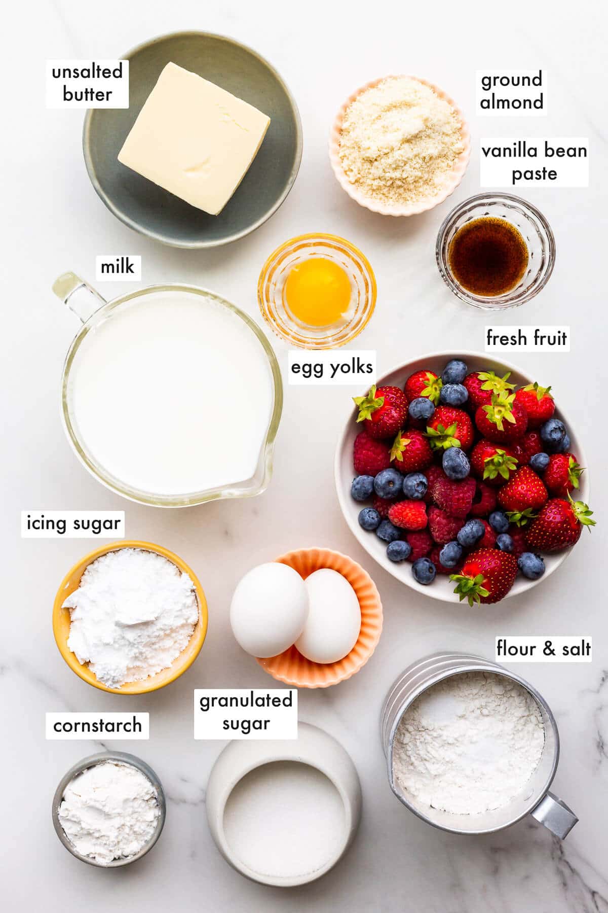 Ingredients to make a fruit tart from scratch measured out.