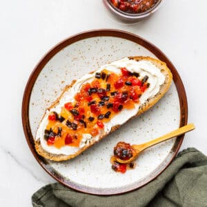 Jalapeño pepper jam and cream cheese on bread.