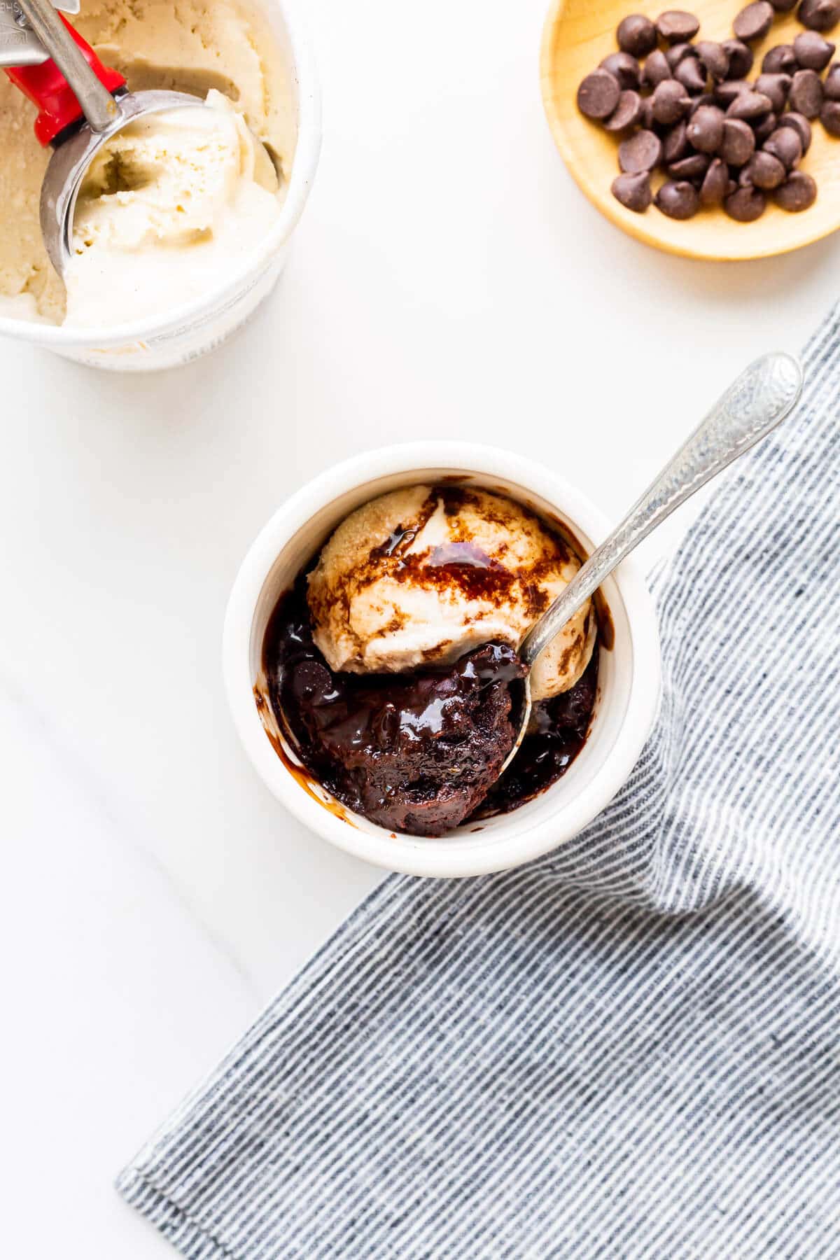 Learn how to make chocolate mug cake from scratch without eggs in the microwave with this easy recipe. It's quick and easy and serves one!