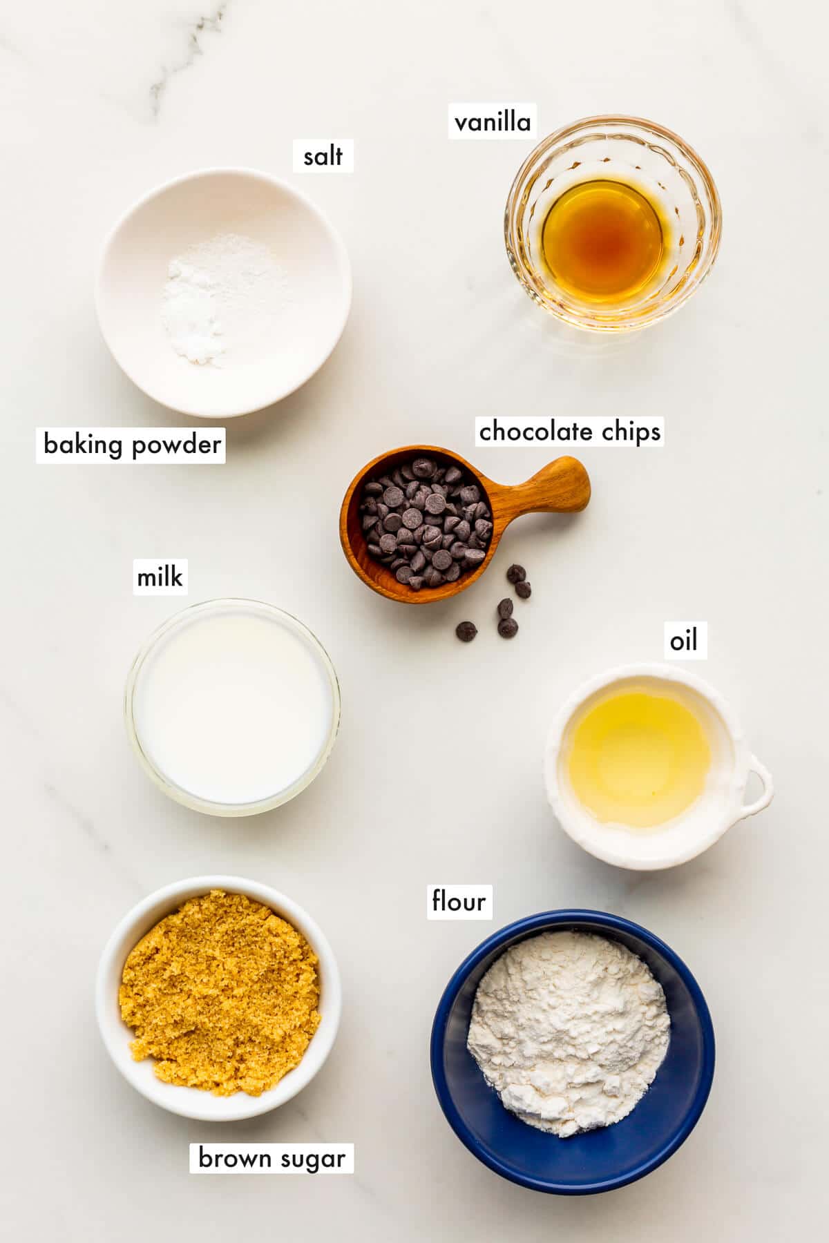 Ingredients to make a chocolate chip mug cake from scratch.